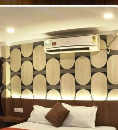 Hotel Royal Regency Signature Suite Bedroom with halo backlighting